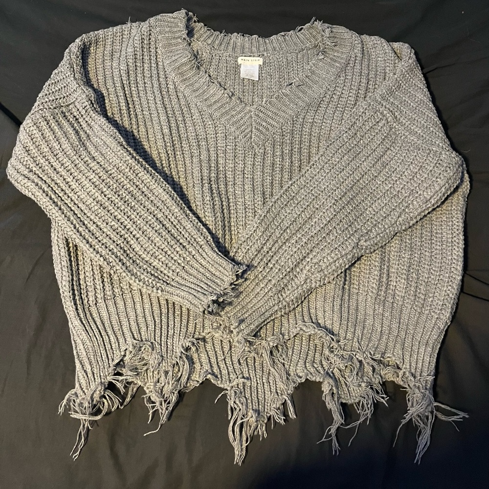 Grey sweater.